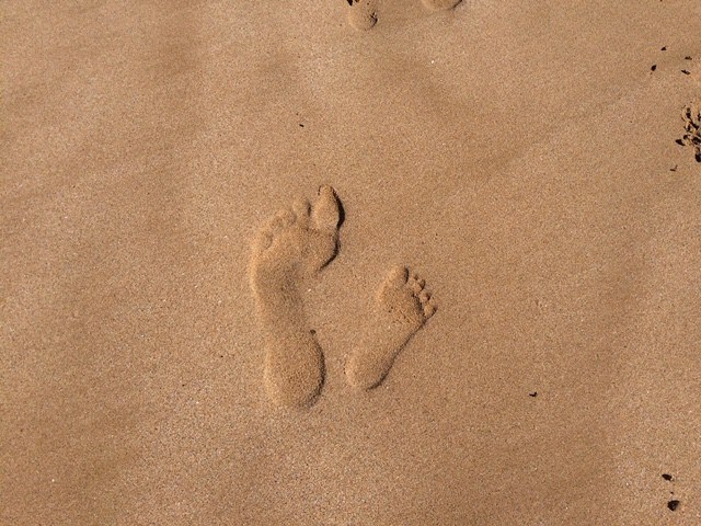 footprints on the beach on maui