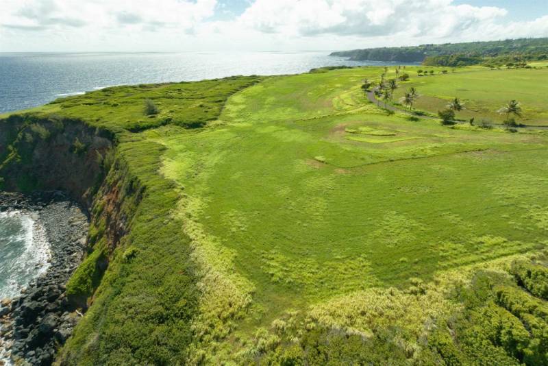 grassy cliffs of peahi farms on north shore maui