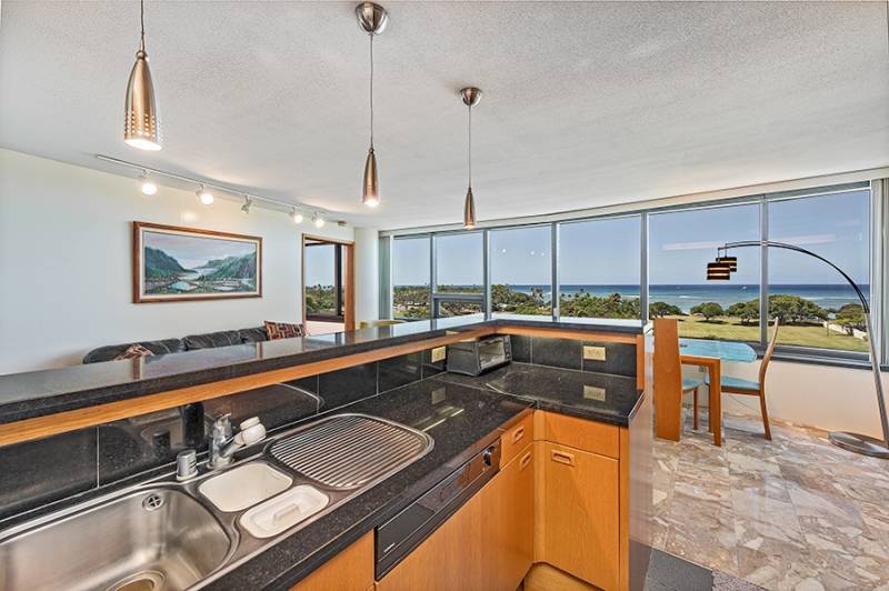 modern kitchen enjoys wide ocean views