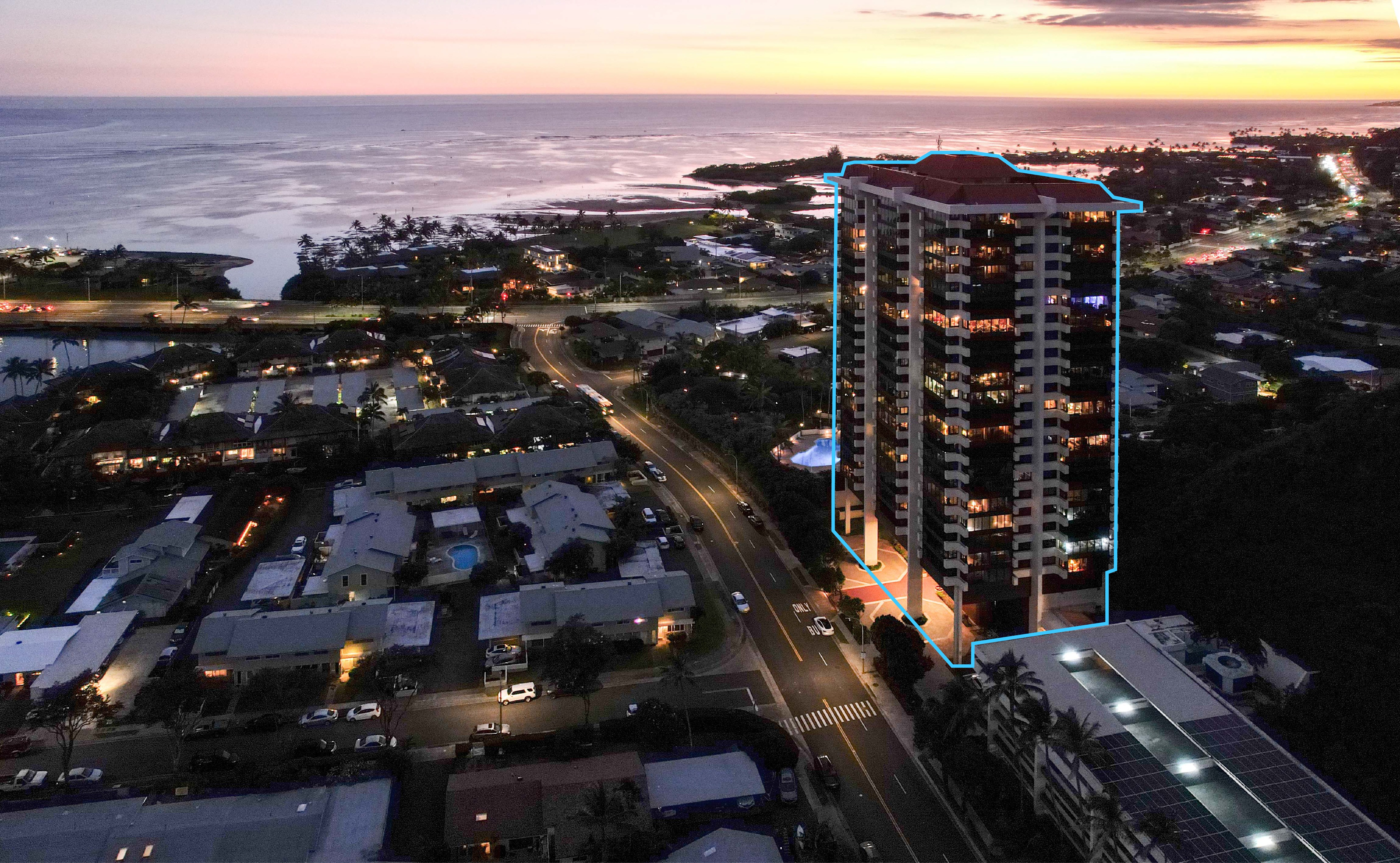 drone shot of mt terrace condos at sunet