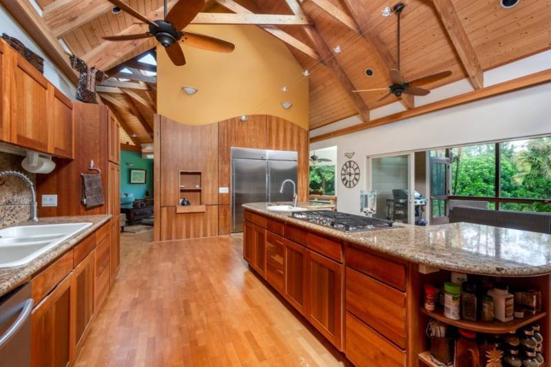 kitchen with wood floors and ceilings