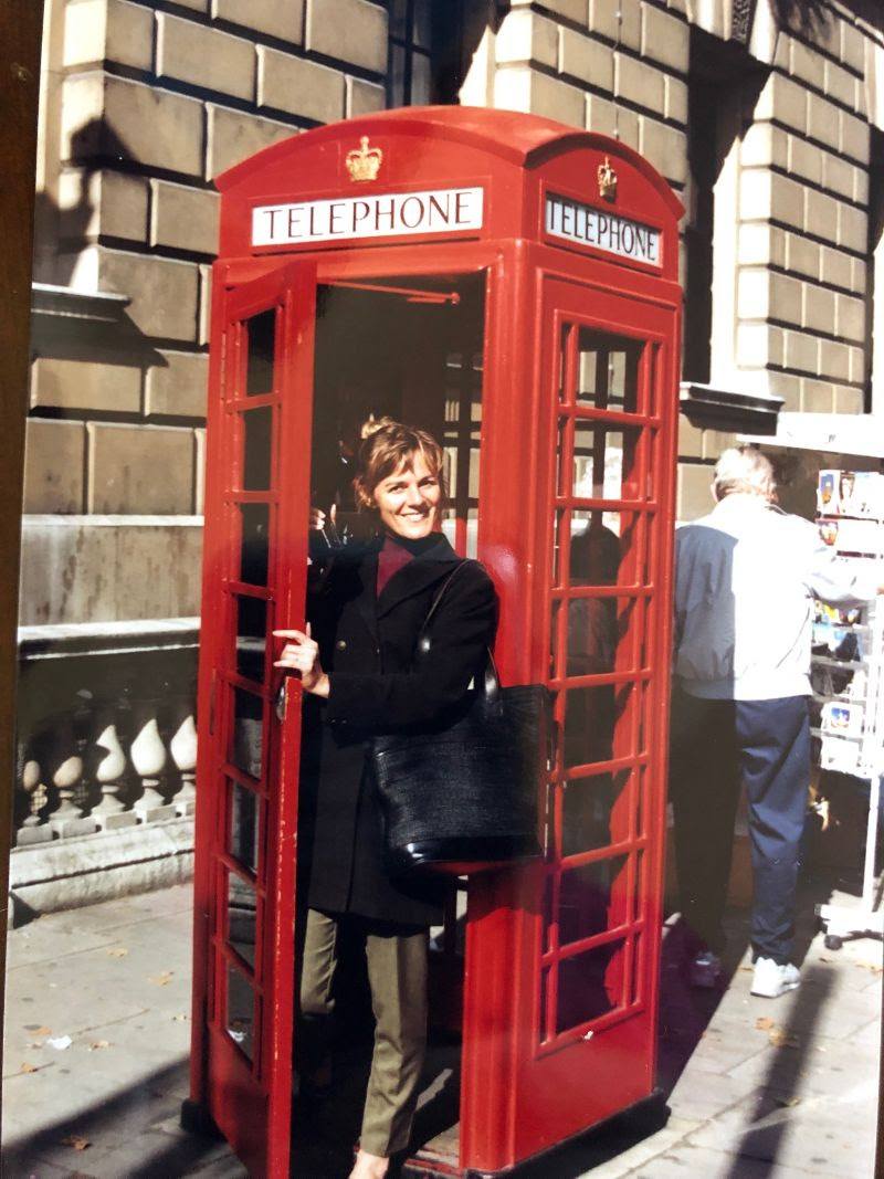 woman in british telephone booth