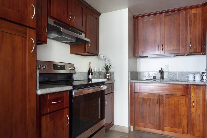 kitchen with cherry wood cabinets