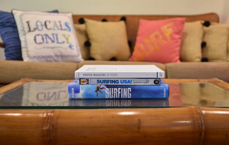 surfing books on coffee table