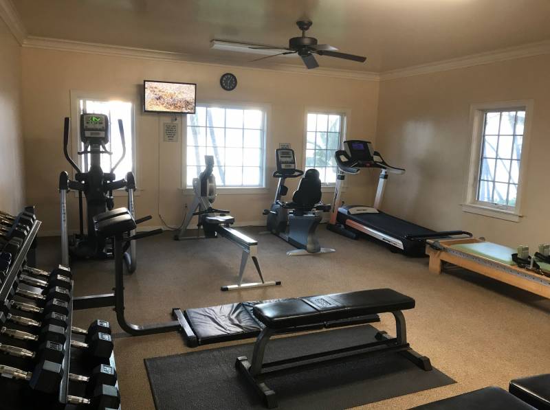 gym room with exercise equipment
