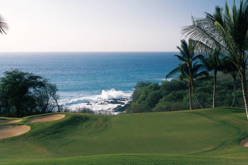 waves crashing near hokulia golf course on hawaii island