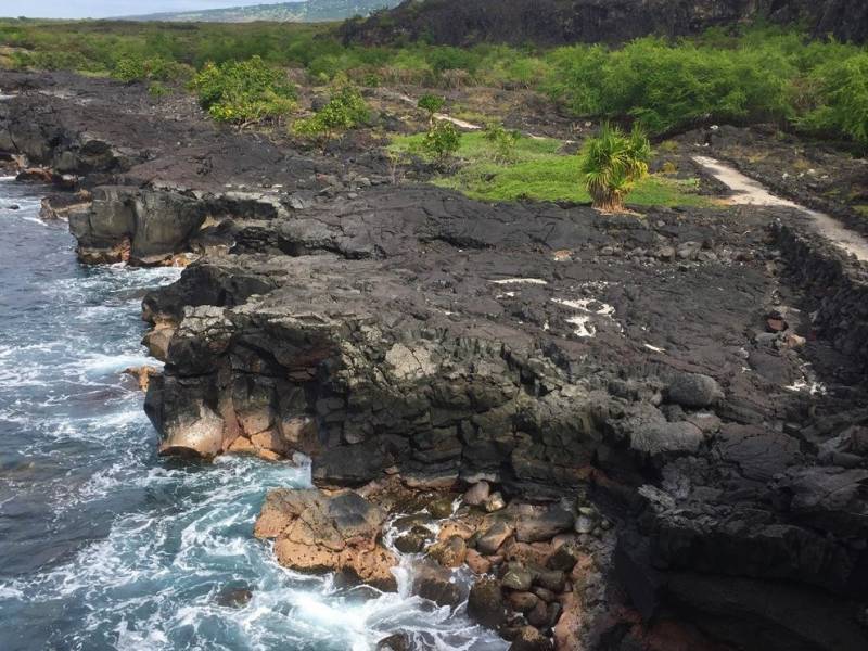black volcanic rock on big island coastline