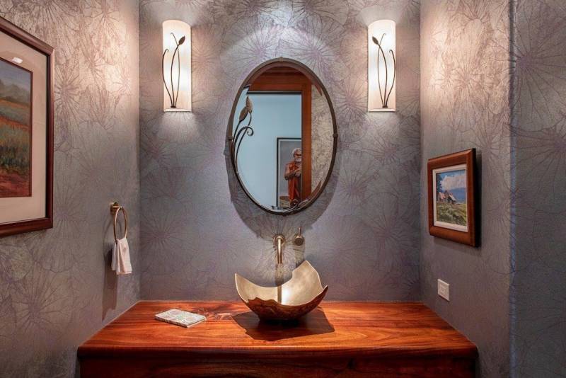 bathroom vanity with organically shaped vessel sink