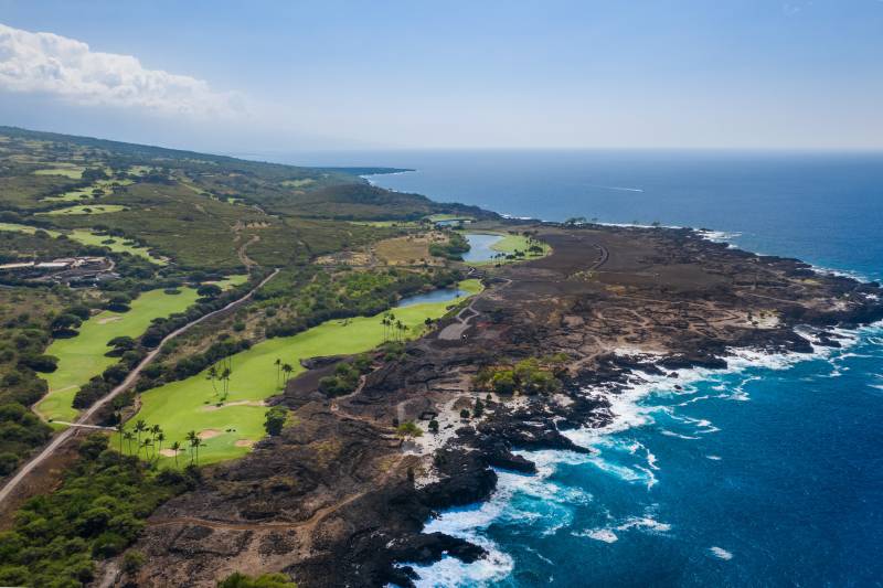 aerial view of luxury ocean front golf course at hokulia