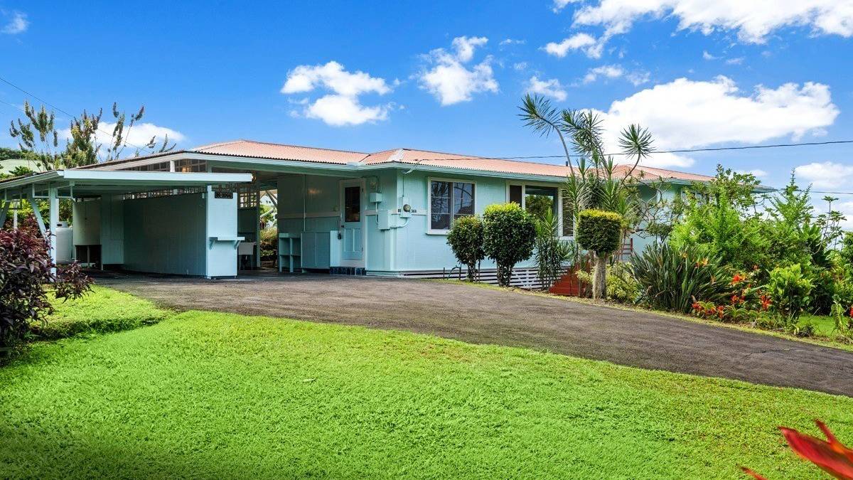 New Listing With Ocean Views and Enchanting Landscaping in the Heart of Kaʻawaloa Hawaii Real