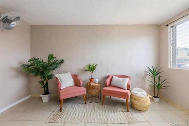 two pink chairs in honolulu condo for sale