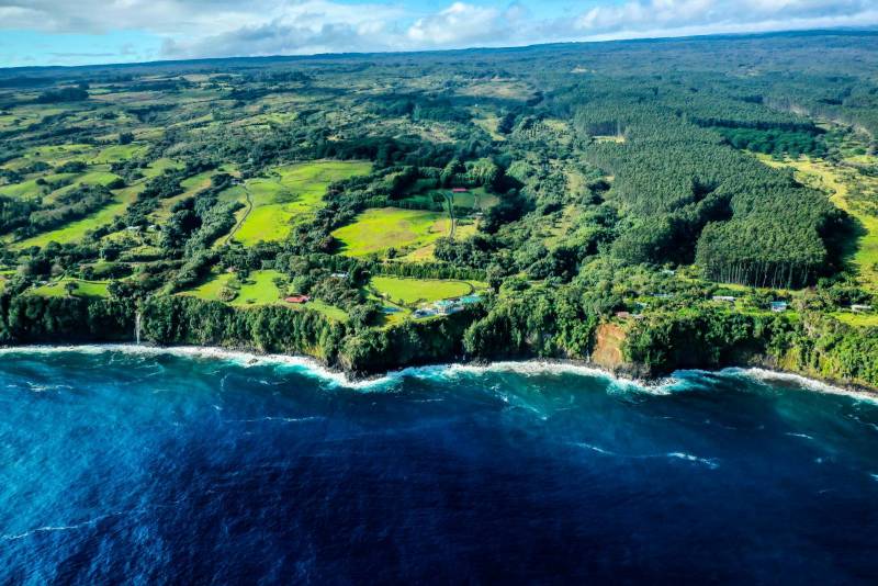 aerial view of waterfalling estate big island