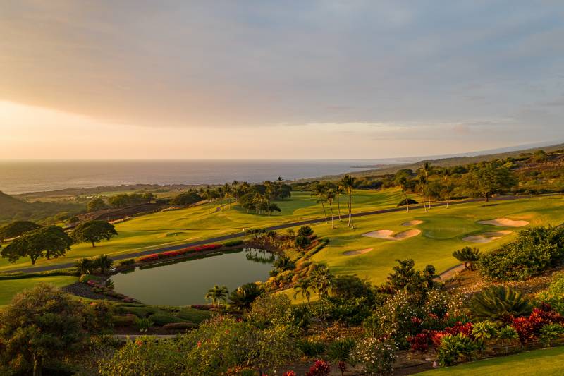 view of gold course at hokulia at sunrise