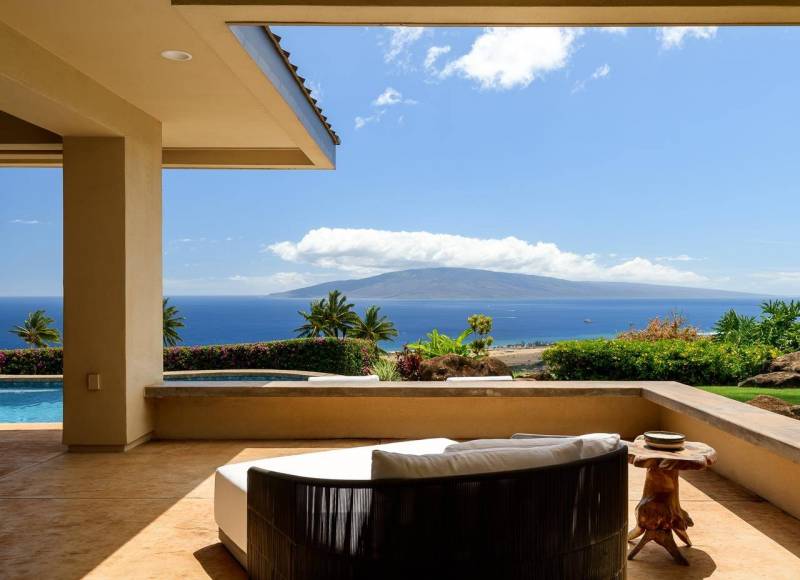 view from back of maui home overlooking large ocean views and lanai island