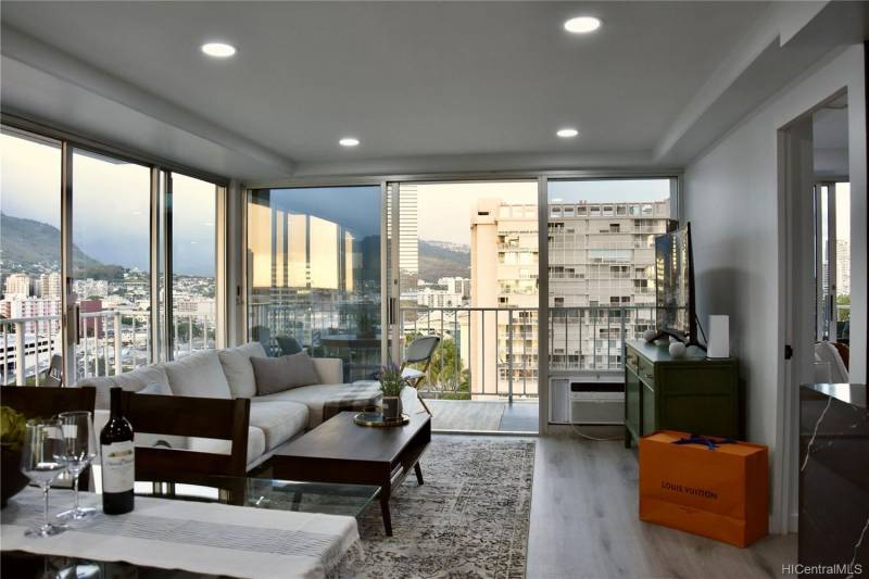 honolulu city and mountain views from the living room floor to ceiling windows
