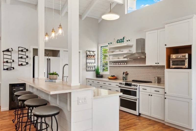 bright white kitchen with high vaulted ceilings