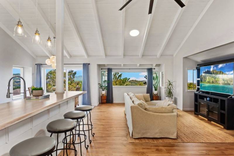 open concept kitchen and living room in kalaheo kauai home