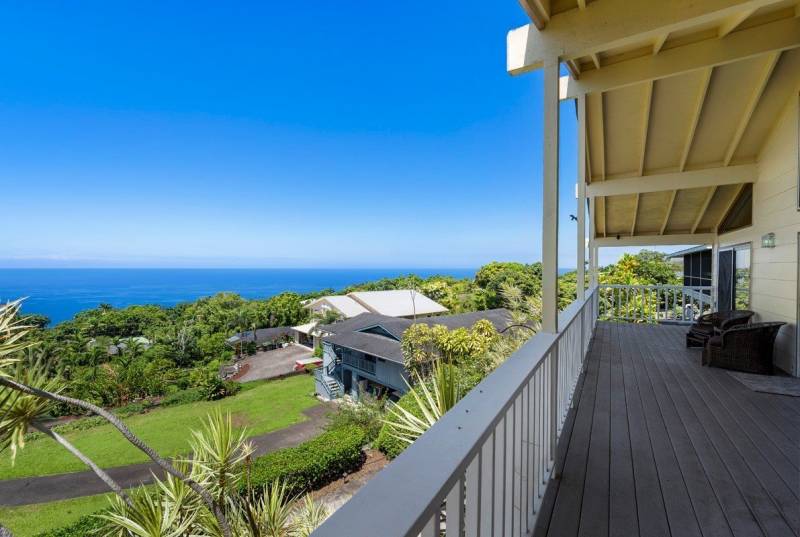 roomy balcony provides big ocean views in this big island home