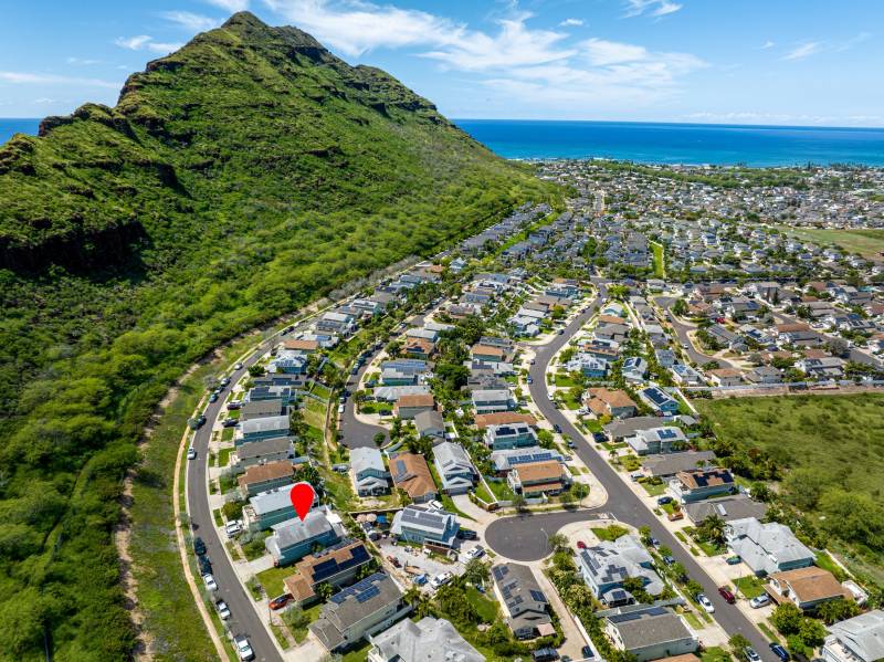 aerial view of west oahu neighborhood and mountain