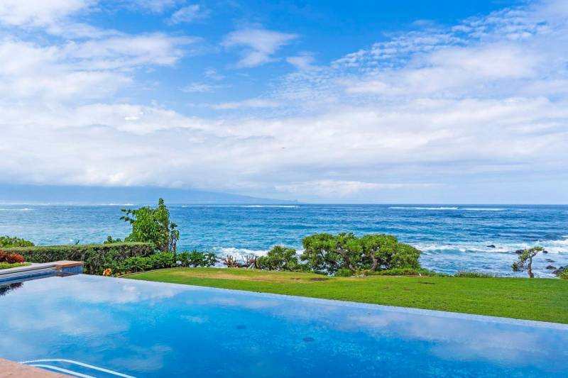 view of pool and ocean from paia maui home for sale