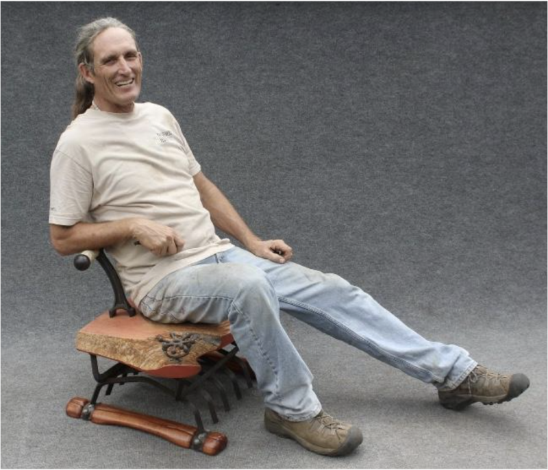 artist sitting on chair he made