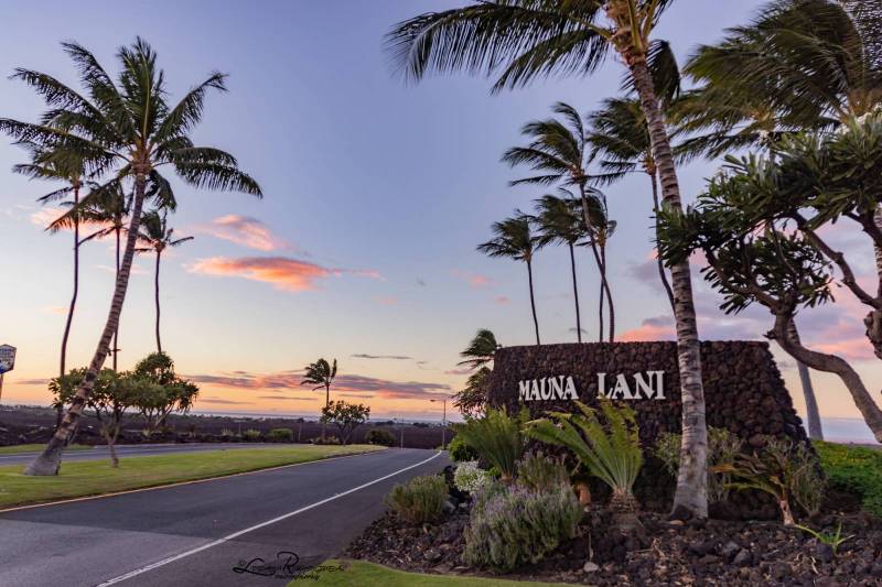 entrance to maui lani community on big island hawaii at suset