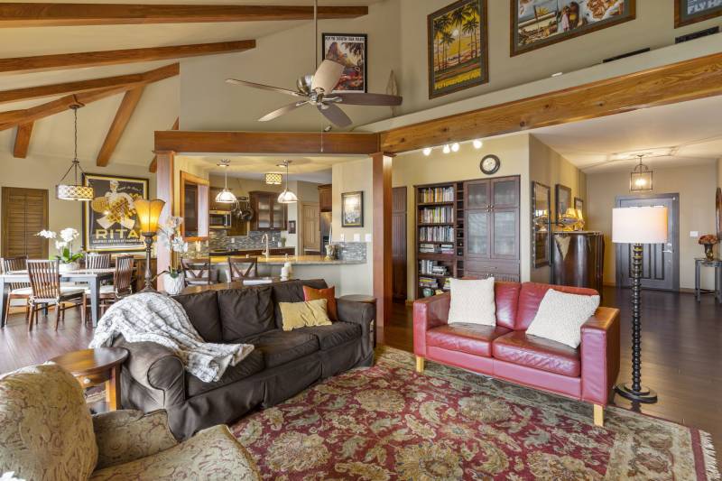 interior maui home large open living space with wood beams on ceiling