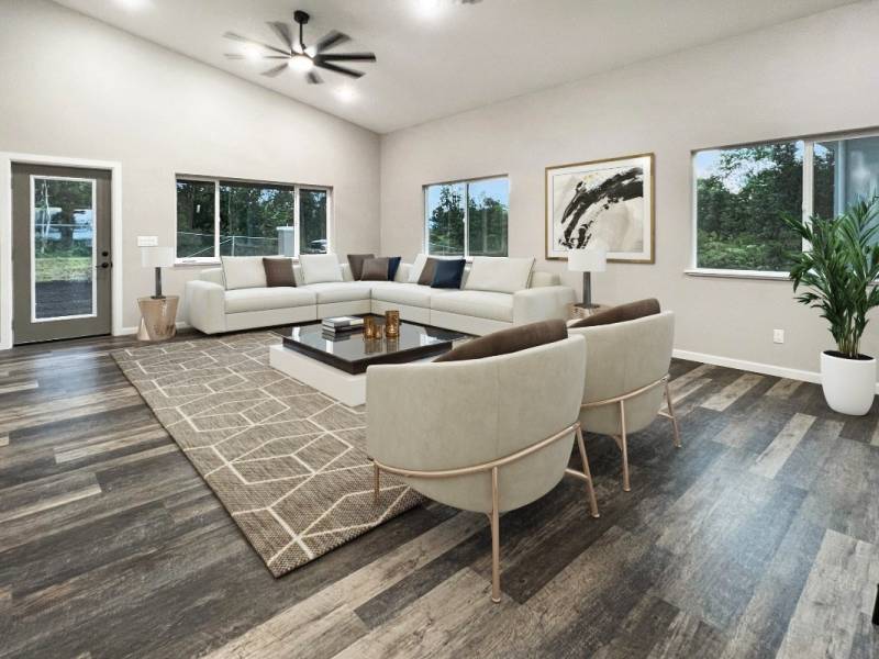 gray wood floors and white furniture in living room