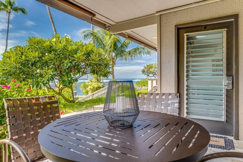 lanai with table and chairs and ocean views on maui