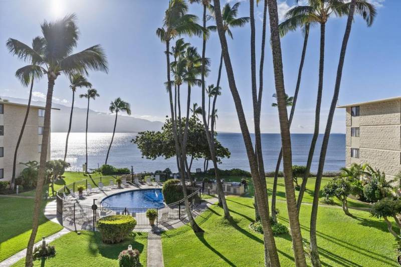 view of pool and ocean beyond in south maui condo Kanai A Nalu