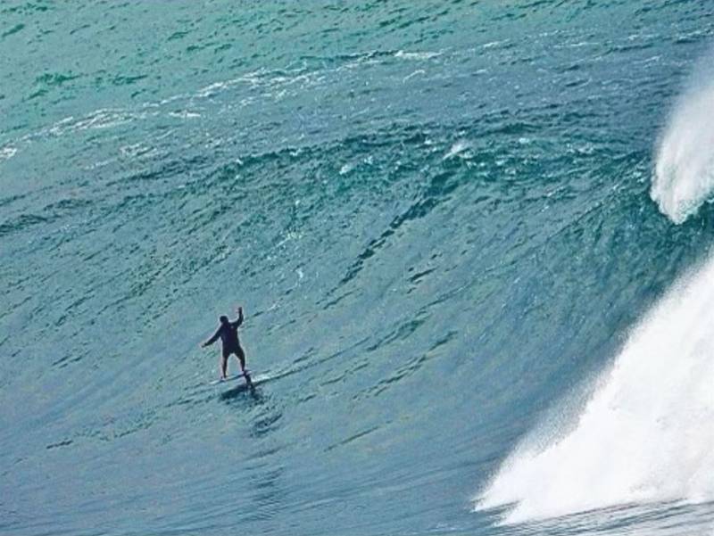 man surfing in kauai