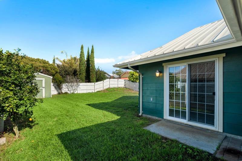 grassy backyard in big island home for sale
