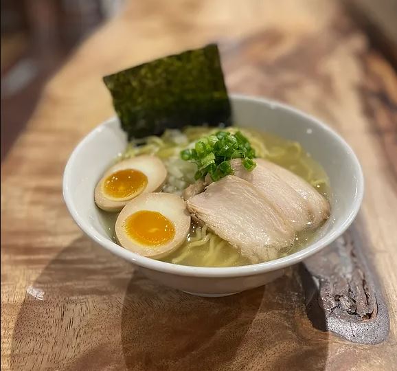 bowl of ramen with egg and pork