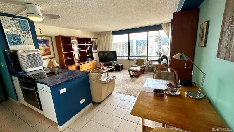 kitchen and living room in honolulu condo for sale