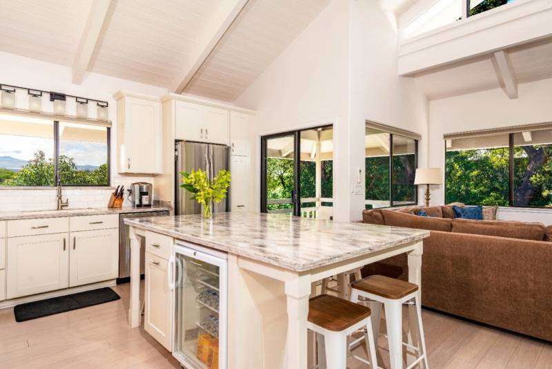 light and bright kitchen with wine fridge in island