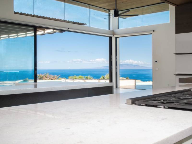 large windows in modern maui home showcase ocean view