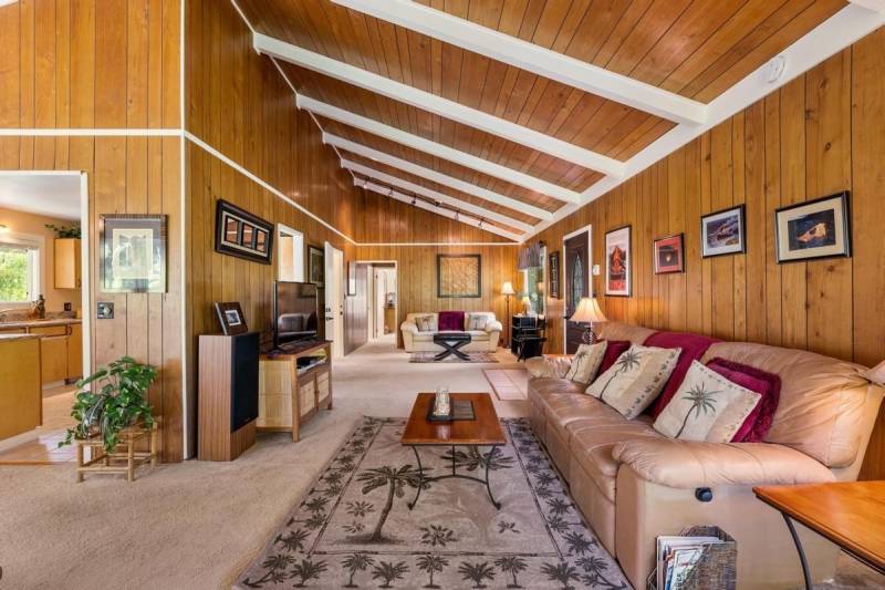wood paneling on walls and ceiling in big island home