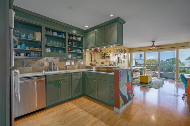 colorful green kitchen cabinets