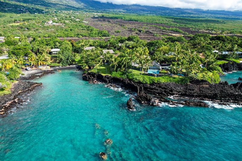 black rocky coastline on big island hawaii