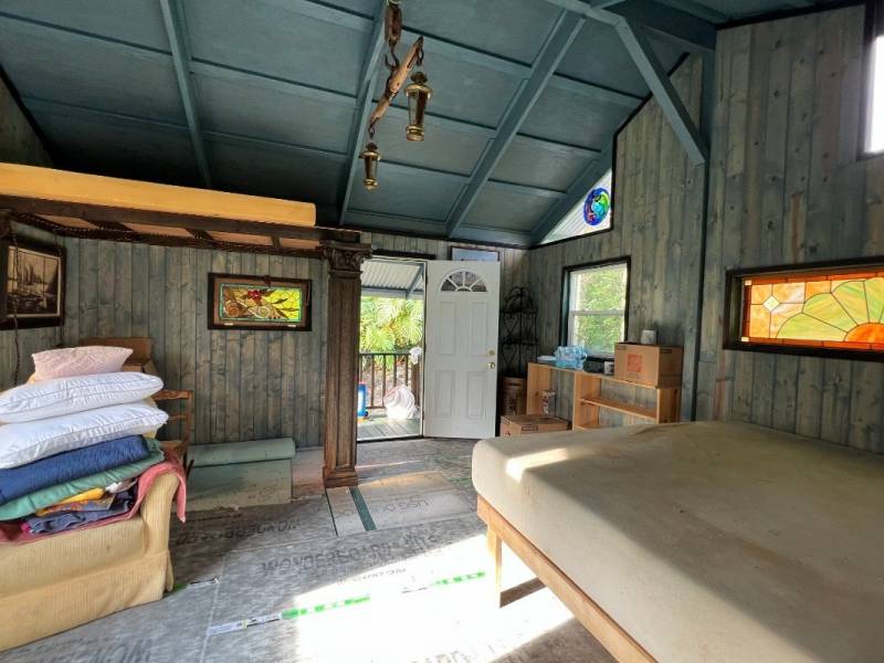interior off grid cabin with plywood floors