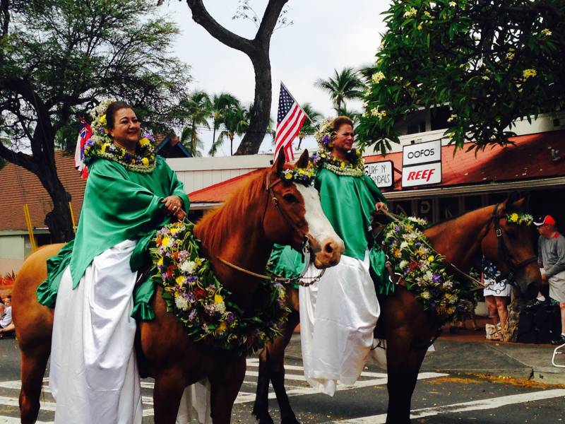 Paʻu riders on horseback during Kamehameha Day parade
