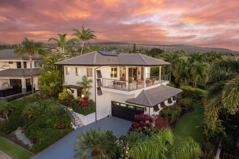 exterior view of wailea maui home at sunset