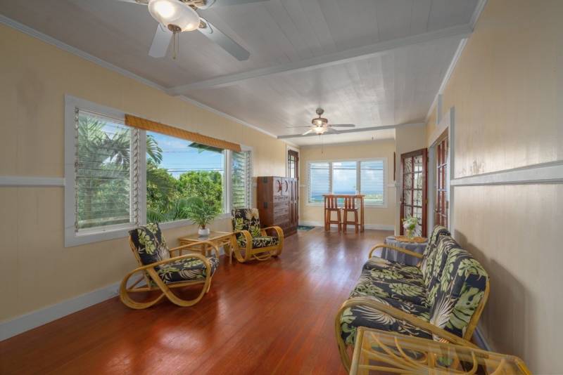 sparsely furnished living room in big island home