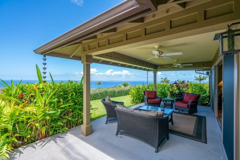comfortable seating on covered lanai with ocean view