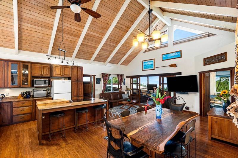 interior big island home with large open kitchen and dining space