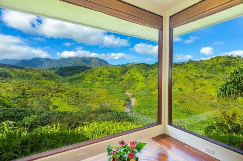 lush green mountain view from kauai home