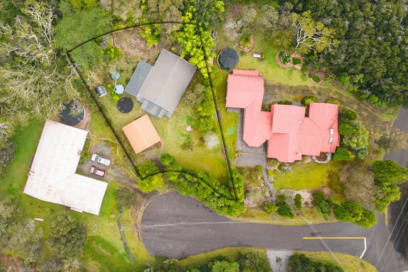 aerial view of home for sale in volcano country club