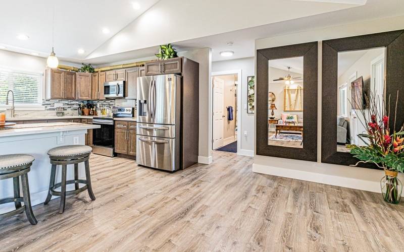 vinyl plank floors throughout the kitchen and living space