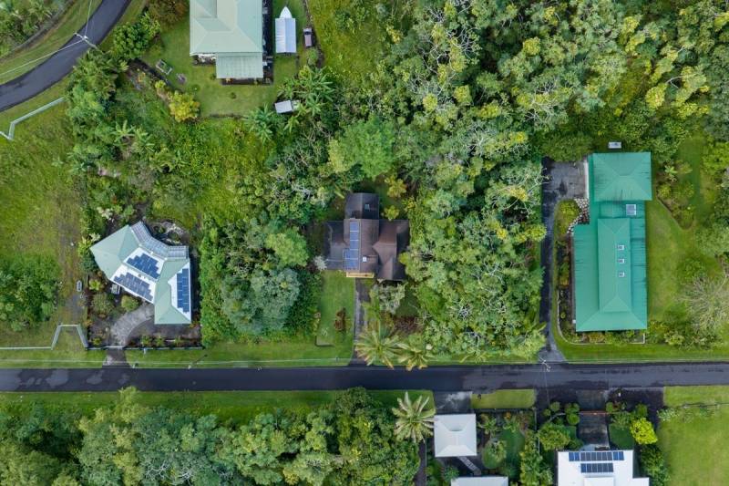 aerial view of home for sale in hawaiian shores neighborhood in pahoa