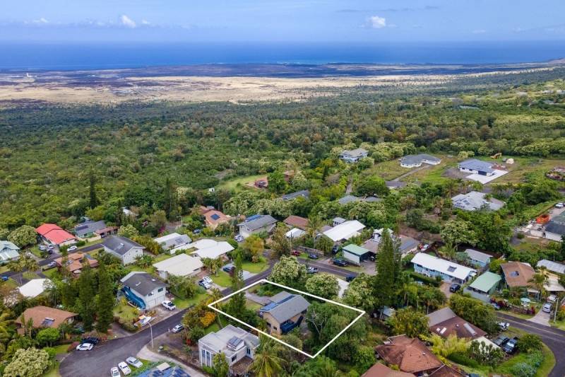 aerial view of neighborhood with home for sale outlined in white